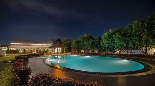 The pool and the main hall, lit up at night